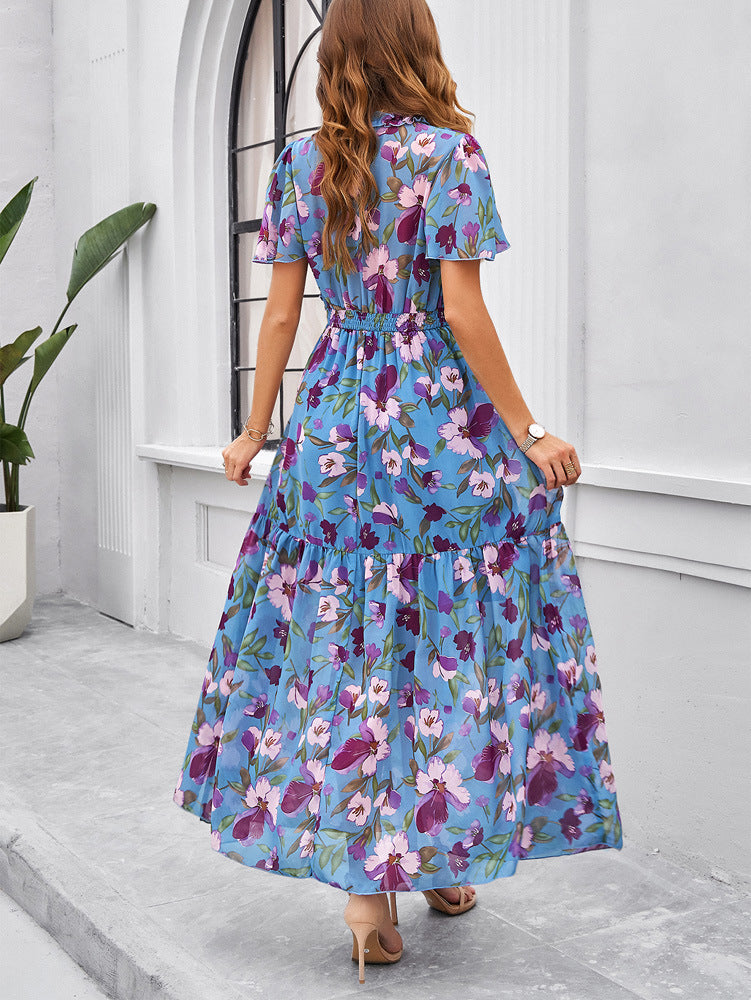 Blauwe V-hals zomerjurk met bloemenprint 